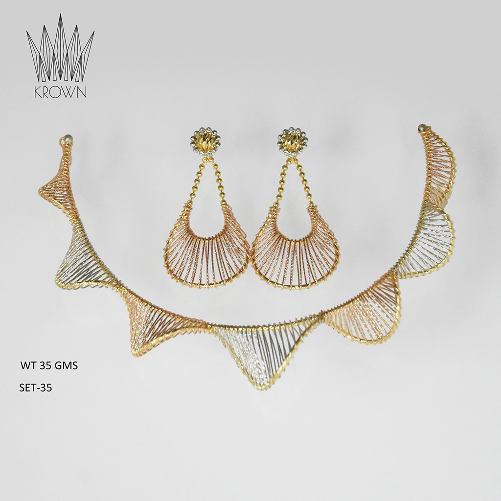 Curve-shaped-necklace-crafted-with-detailed-laser-work-with-complete-cutting-wires-and-Rose-gold-and-white-color-plating.-Product-code-Set35-wt-35-grams22ct-Can-be-made-in-18kt-..jpg